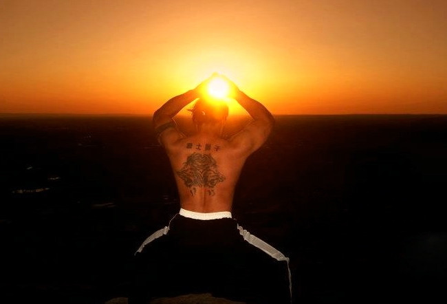 Cosmo holding the sun